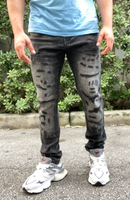 Ripped And Destroyed Faded Black Skinny Jeans