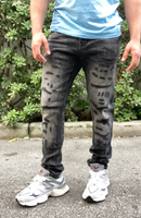 Ripped And Destroyed Faded Black Skinny Jeans